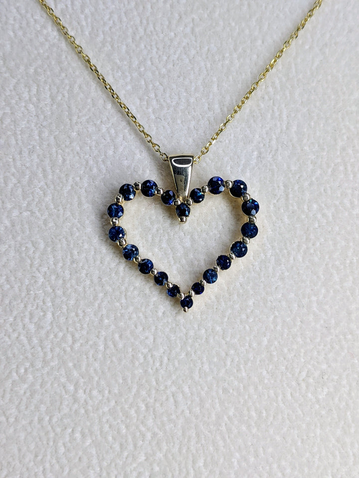 Blue Sapphire Shared Prong 0.80 Carat Heart Pendant in Yellow, Rose and White Gold 16" Chain