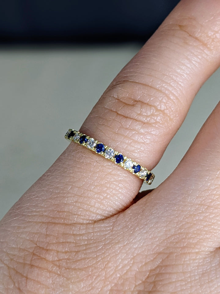 0.75 Ct. Tw. Brilliant Round Cut Diamond & Natural Sapphire Eternity Ring