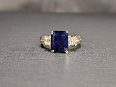 3.00 Ct. Tw. Emerald Cut Natural Blue Sapphire with 1.00 Ct. Tw. Diamond Ring