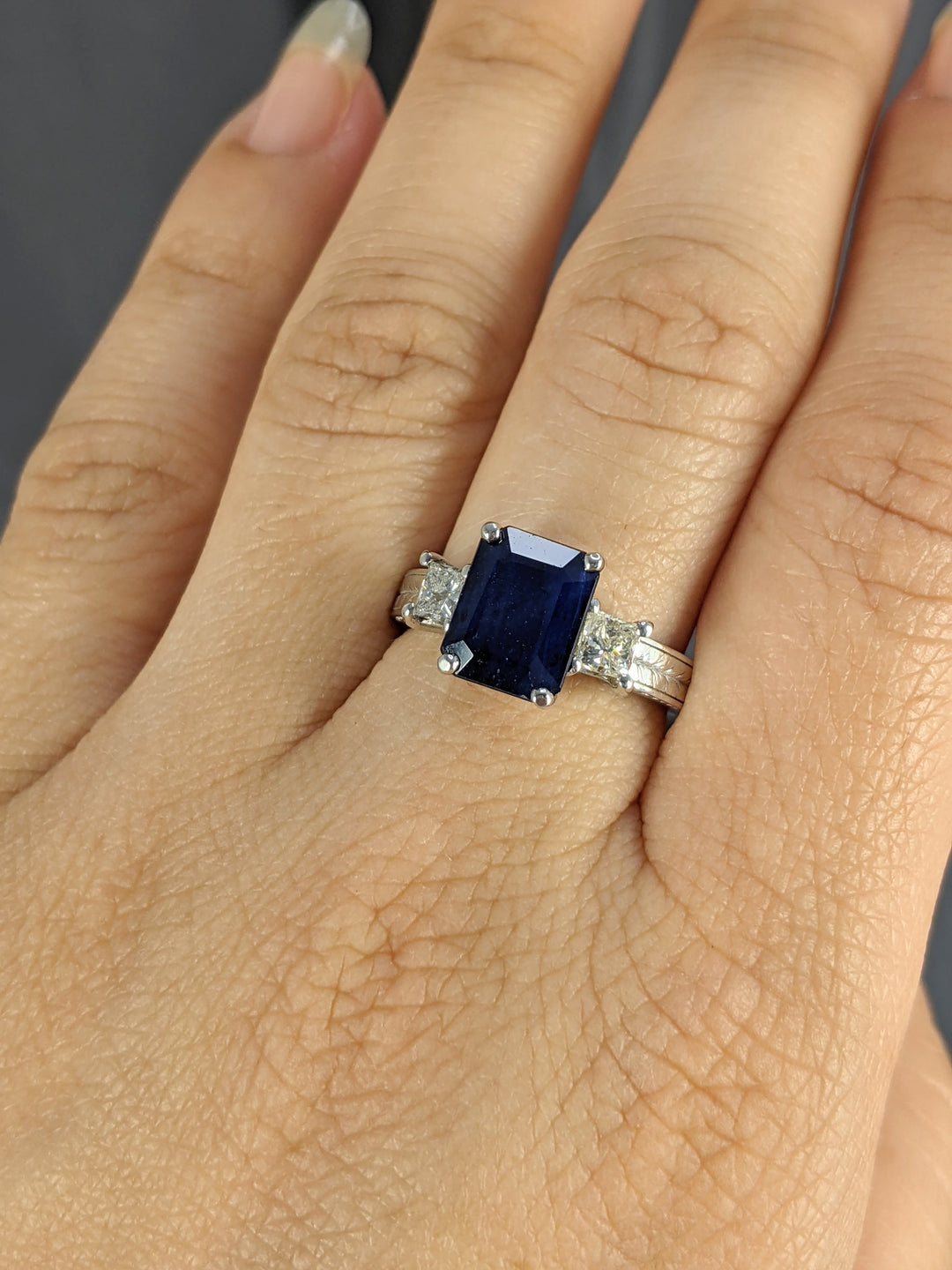 3.00 Ct. Tw. Emerald Cut Natural Blue Sapphire with 1.00 Ct. Tw. Diamond Ring