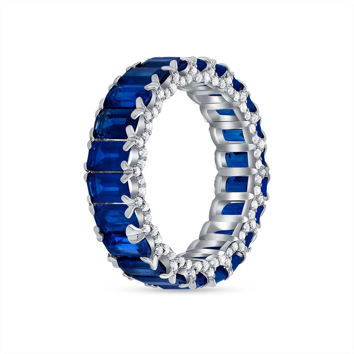 6.00 Ct. Tw. Emerald Cut Natural Blue Sapphire with 0.50 Ct. Tw. Round Diamonds Eternity Ring