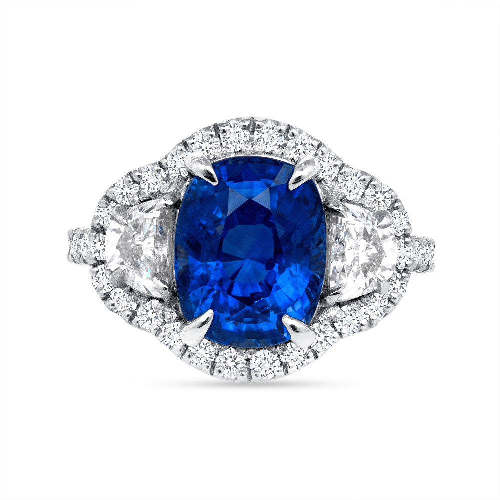 Halo Design 2 Ct. Tw. Oval Cut Natural Blue Sapphire with 1.25 Ct. Tw. Half Moon and Round Cut Side Diamond Ring