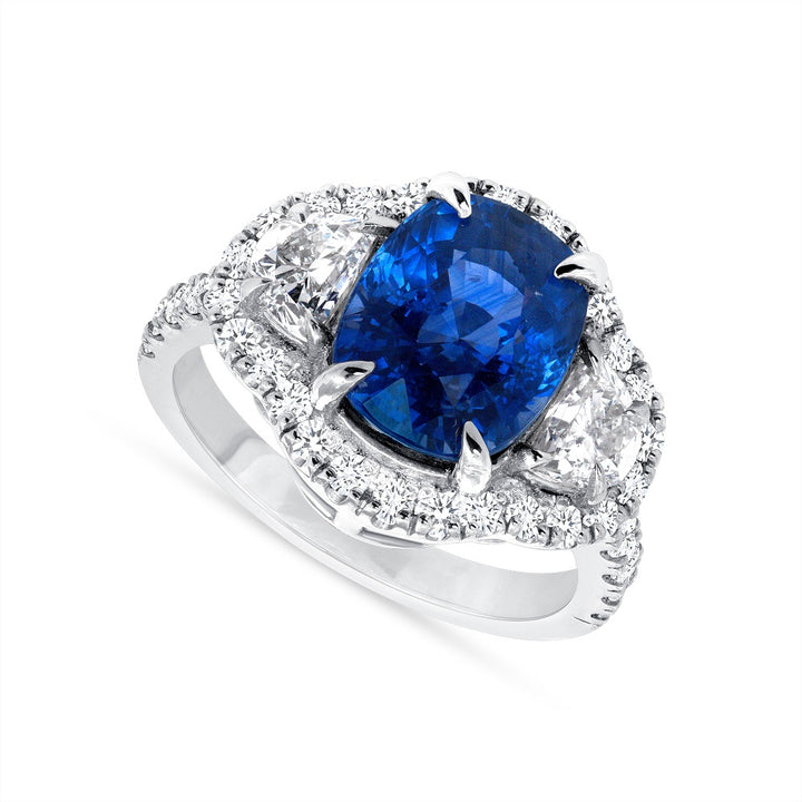 Halo Design 2 Ct. Tw. Oval Cut Natural Blue Sapphire with 1.25 Ct. Tw. Half Moon and Round Cut Side Diamond Ring